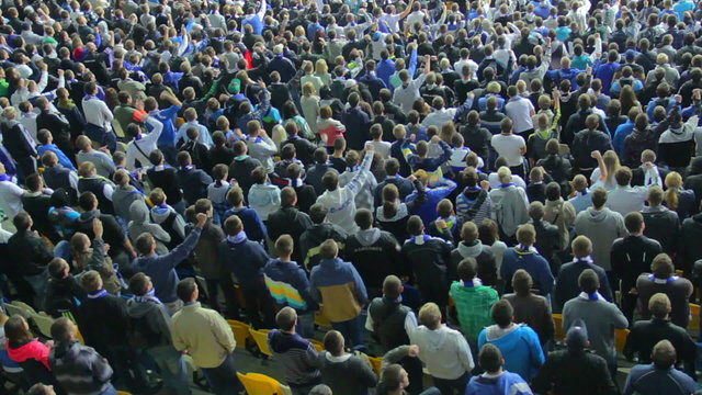 Shouting football supporters raising hands fans shout team match