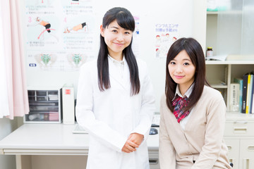 two asian women in clinic