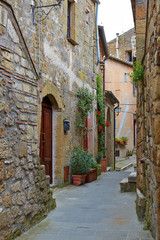 Narrow Alley With Old Buildings In Italian City