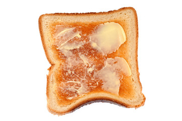 Tranche de pain de mie toastée et beurrée