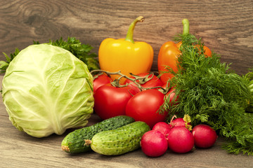 set of vegetables on a wooden background