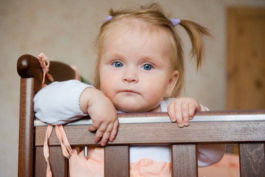 Sad Baby In The Crib