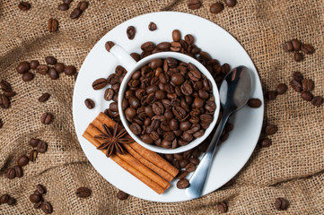 Coffee beans and coffee cup.