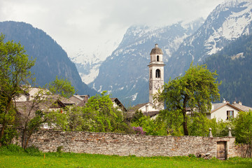 Old village and church in alpine landscape, Soglio, Switzerland