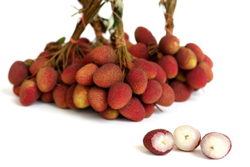 Lychee. bunch of fresh lychees isolated on white background