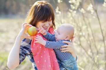 Young woman with her little baby boy