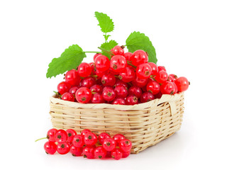 Red currant on wooden basket
