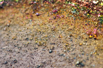 Fantastic background, magic of a stone, rainbow in metal rock