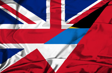 Waving flag of Antigua and Barbuda and UK