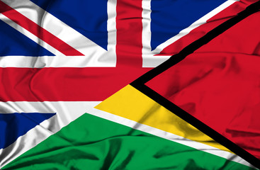 Waving flag of Guyana and UK