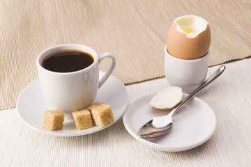 Breakfast of scrambled eggs and coffee