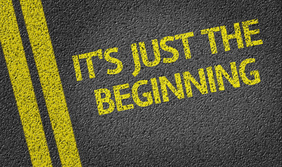It`s Just the Beginning written on the road