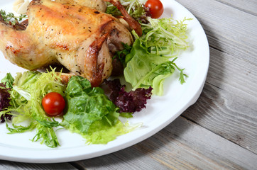The baked hen with salad