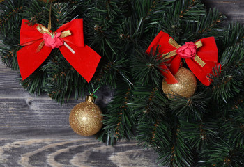 Christmas branch of a fur-tree on a wall