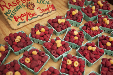organic raspberries for sale at a a Farmers Market