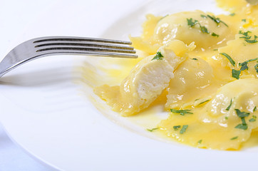 House ravioli a stuffing from ricotta and a potato with a butter