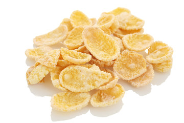 Sweet, tasty cornflakes, crunchy dry on white background