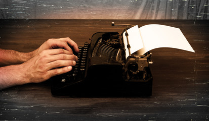 Writer or reporter behind the typewriter