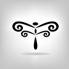 the stylized silhouette of a dragonfly on a light background