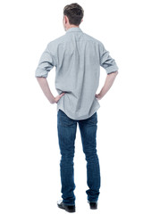 Fototapeta premium Back pose of smart young guy