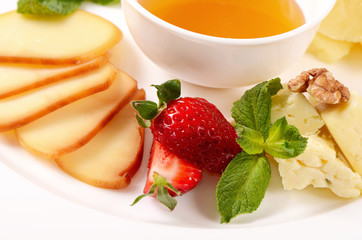 Assorted cheese with honey