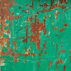 Painted green rusty metal surface