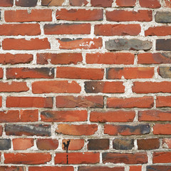 Old red brick wall fragment