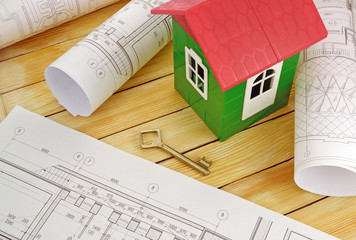 Model house with design drawings