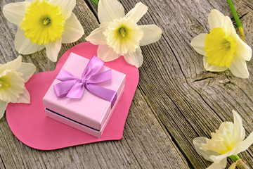 Gift with hearts and flowers