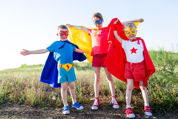 children  acting like a super hero