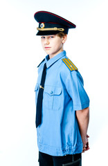 Boy in police uniform with gun