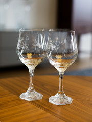 two crystal wine glasses