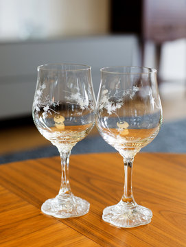 two crystal wine glasses
