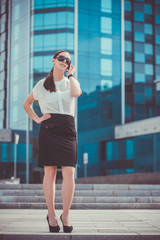 Fototapeta premium Successful businessman talking on cellphone.