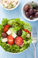 healthy salad with tomatoes olives and feta cheese