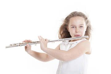 young girl playing flute