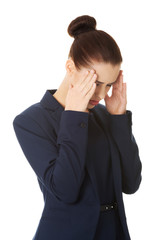 Young woman suffering a headache