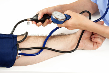 Doctor monitoring the blood pressure of a patient, isolated