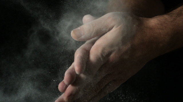 Bakers Hands Clapping Flour Off On Black Background