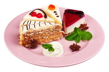 Assortment of pieces of cake, isolated on white © Africa Studio