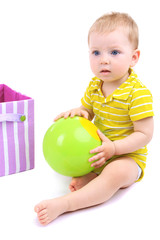 Cute little boy with textile box and ball isolated on white