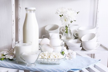 Still life with tasty dairy products on table