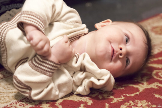 Close-up of a baby boy playing