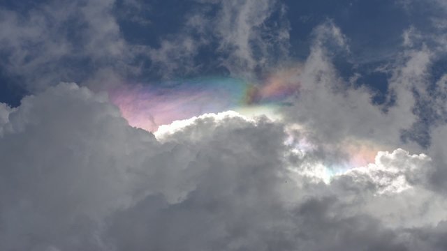iridescent clouds phenomenon on before rain.