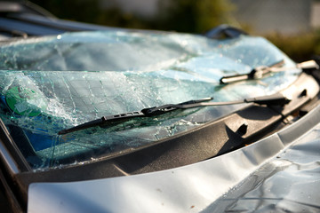 Shattered windscreen of a car in an accident