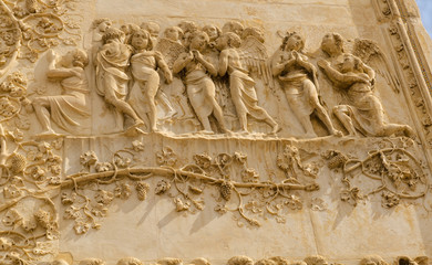 bas-relief, front of cathedral, Orvieto, Italy