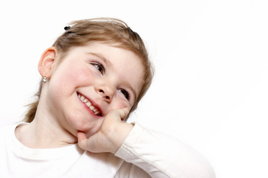 Happy litte girl - studio portrait  on white background