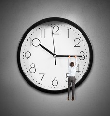 Hanging from the time