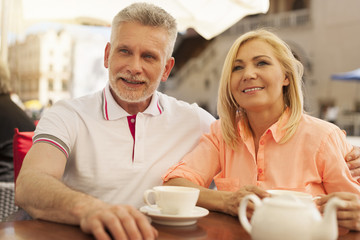 Portrait of mature couple at restaurant