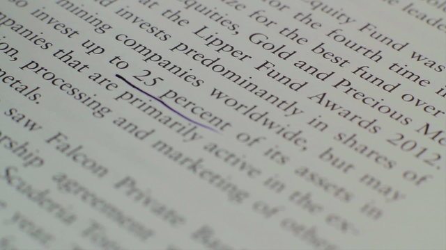 Highlighting text, stock market index, reading financial news